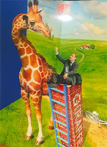 キリンに餌をやってます