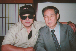 「時の人」藤本健二さんと