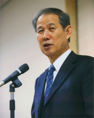 講演する私です