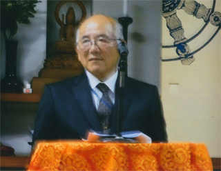 講演する羽毛田信吾さん