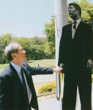 寺山修司と握手