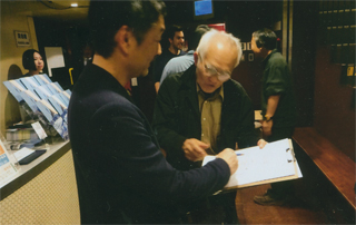 島田さんの肖像を描いてた人が