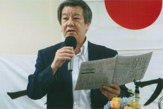 活動報告をする木村代表