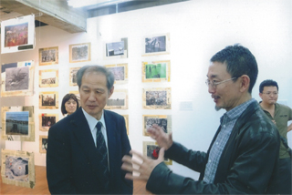 「百年の愚行」展で